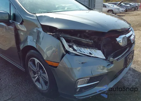 2018 Honda Odyssey Touring from USA, damaged, VIN 5FNRL6H85JB044090